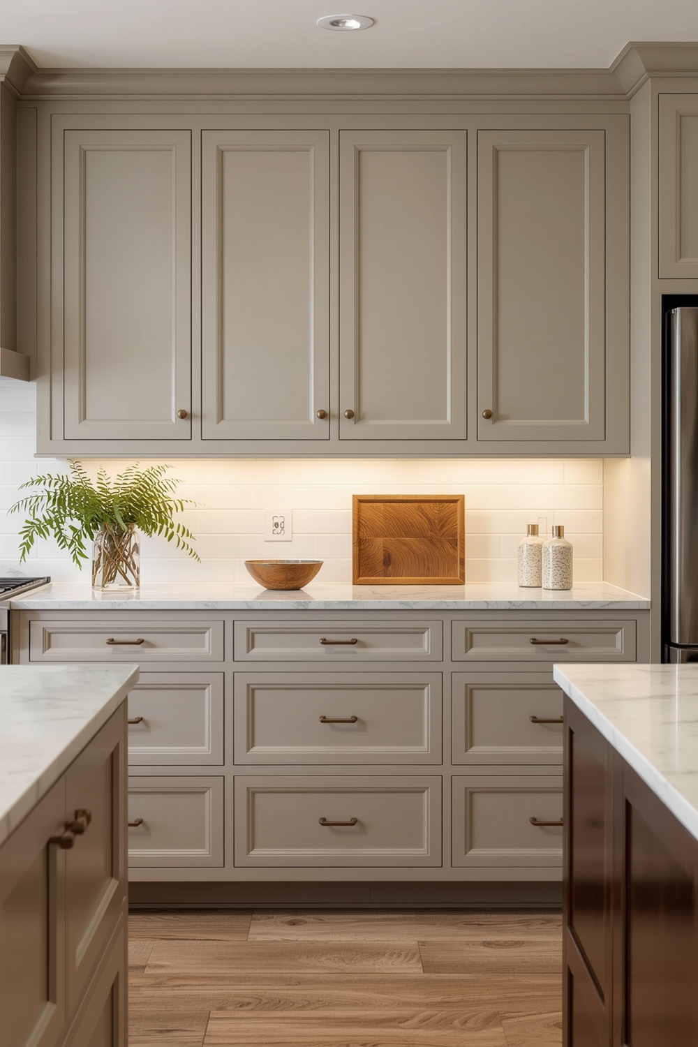 Well-Lit Beige Kitchen Cabinet Arrangement